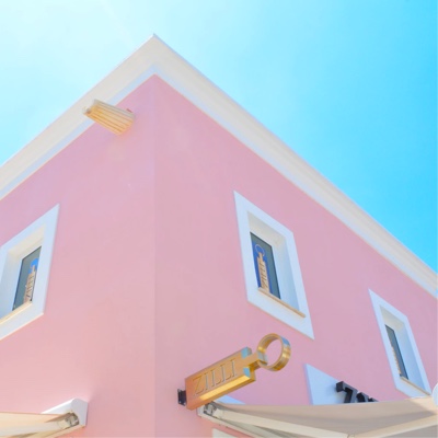 pink building with blue sky