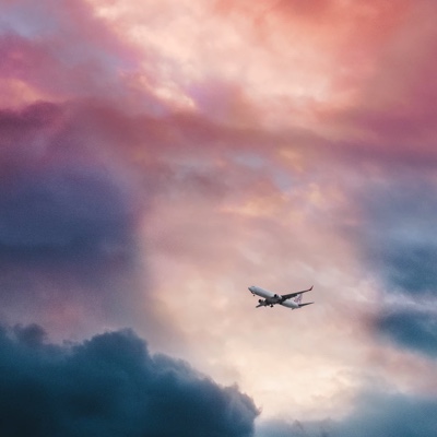 airplane in the colourful sky
